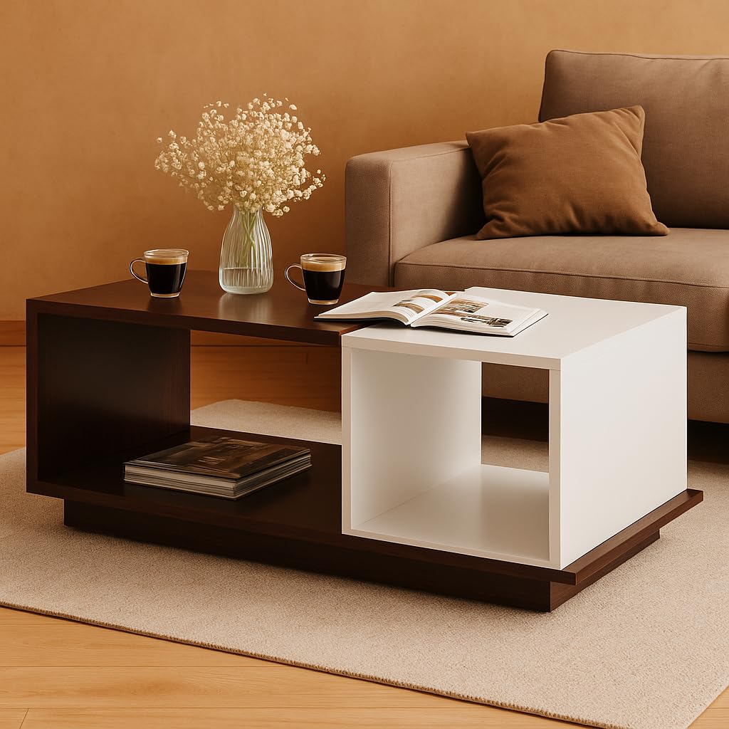 Modern coffee table with books and a vase in a living room setting